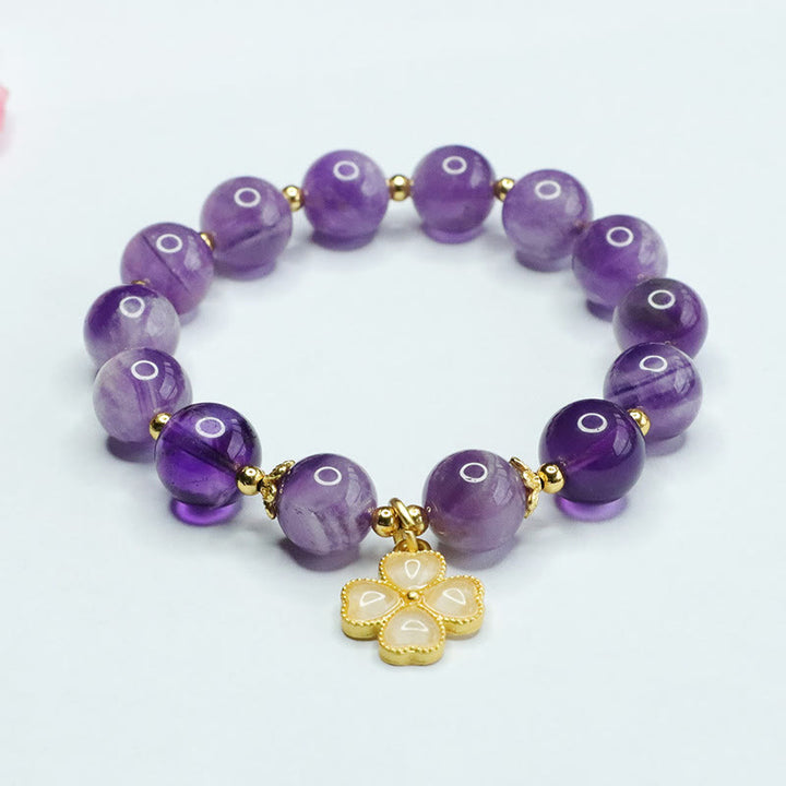 Pulsera con dije de trébol de cuatro hojas y paz interior de cristal de amatista natural con piedras de Buddha Stones