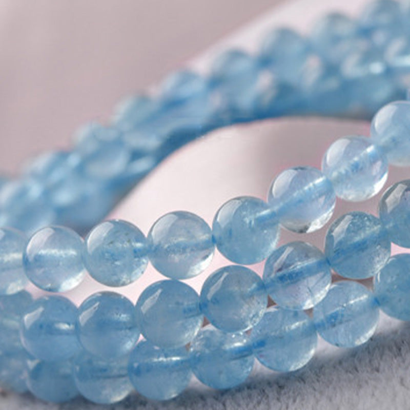 Pulsera curativa de la paz con aguamarina natural de Buddha Stones