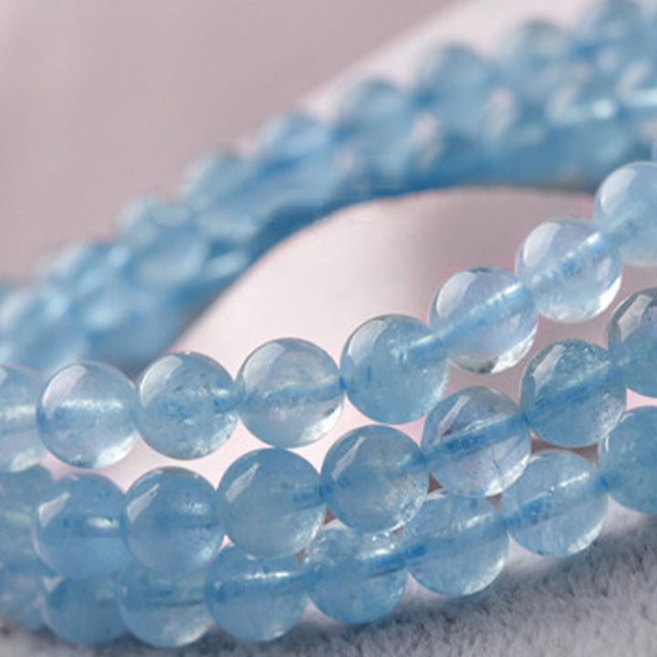 Pulsera curativa de la paz con aguamarina natural de Buddha Stones
