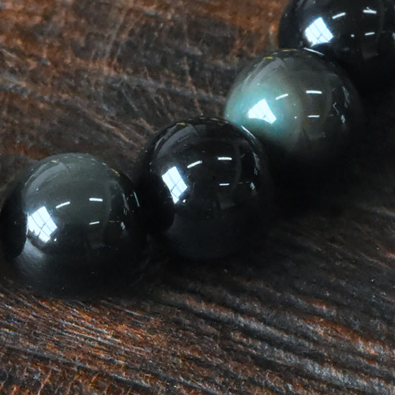 Pulsera de transformación positiva con cuentas de cobre y obsidiana arcoíris de Buddha Stones