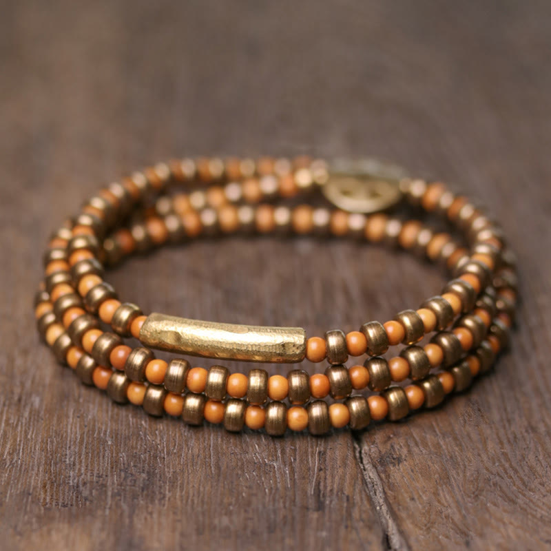 Pulsera de riqueza de cobre con hueso de olivo retro con Buddha Stones