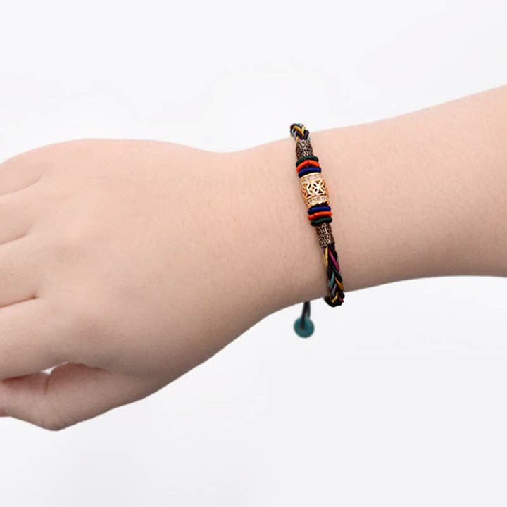 Pulsera de cuerda tejida con moneda de cobre, hecha a mano, con nudo de ocho hilos, Buddha Stones tibetanas - image 4