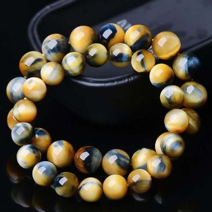 Pulsera de fuerza y valor con protección de ojo de tigre de Buddha Stones