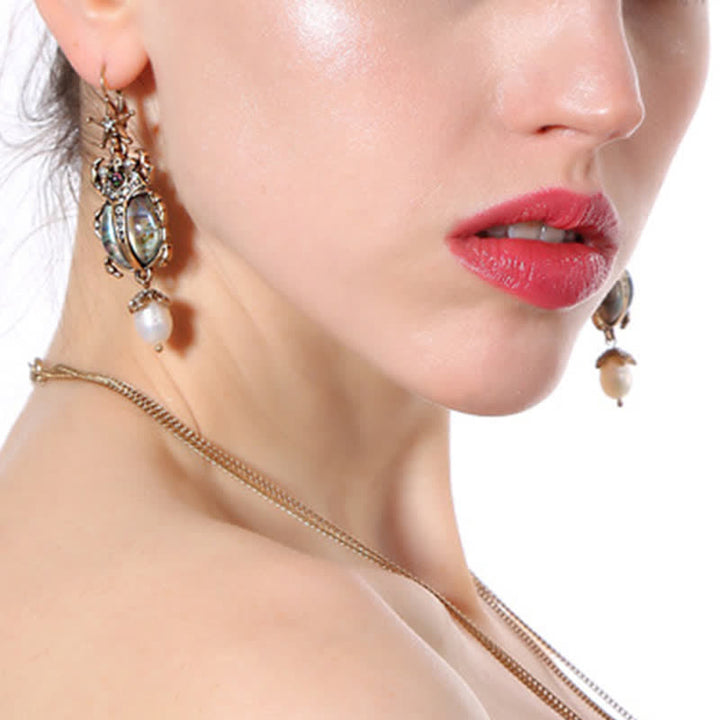 Pendientes colgantes con forma de calavera y escarabajo, estilo vintage, con perlas de cristal y escarabajo