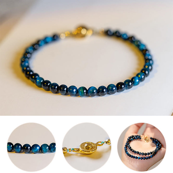 Pulsera de cadena de protección con piedra de ojo de tigre azul natural de Buddha Stones