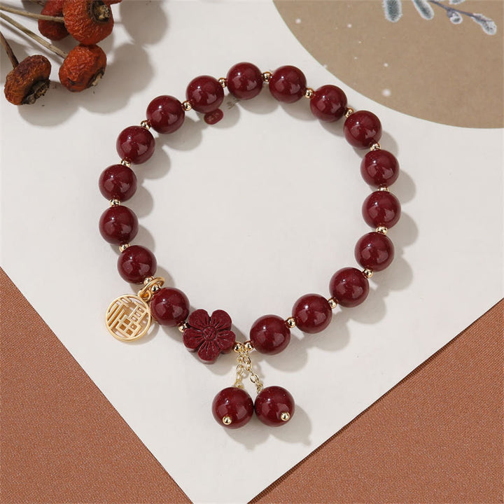 Pulsera de bendición de flor de cerezo con personaje de cinabrio Fu de Buddha Stones