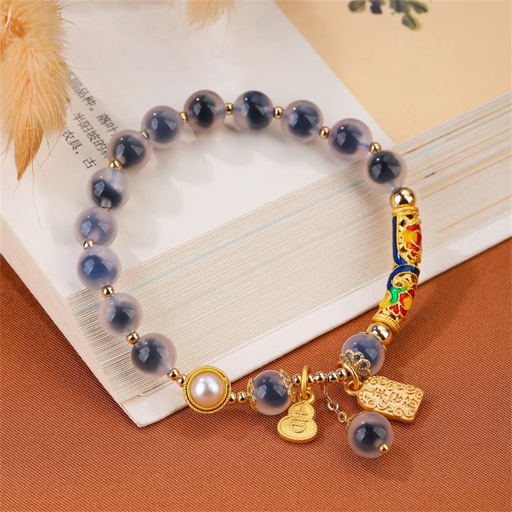 Pulsera de fuerza con amuleto de ágata de caramelo azul natural con Buddha Stones