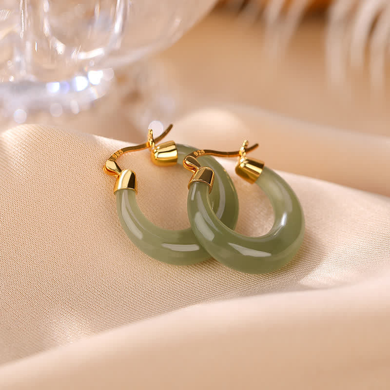 Pendientes colgantes de suerte de prosperidad de jade cian redondo de Buddha Stones