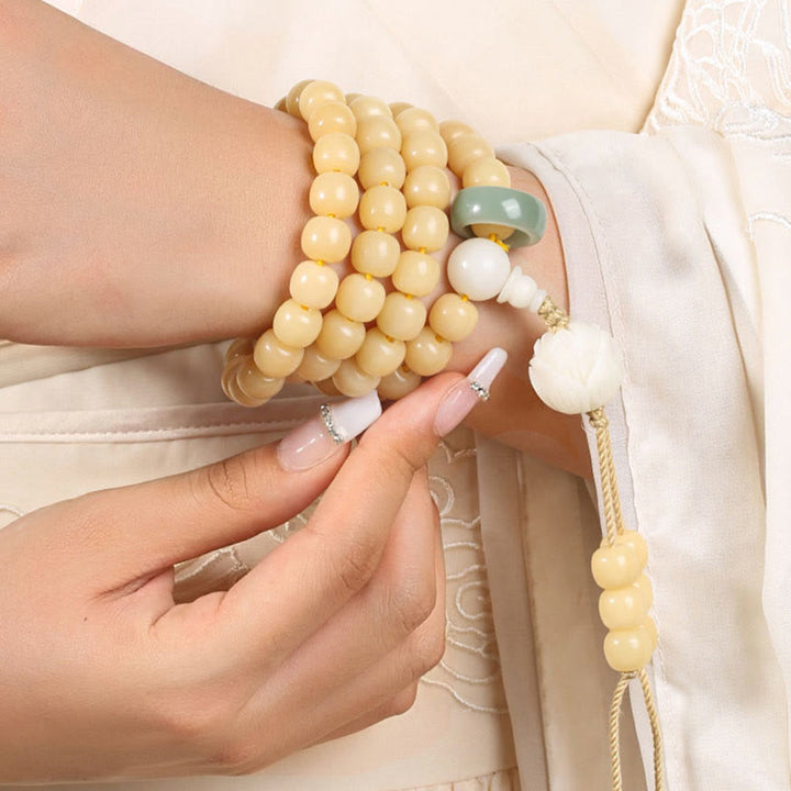 Pulsera con dije de armonía y paz con cuentas de loto y semilla de Bodhi Natural de Buddha Stones