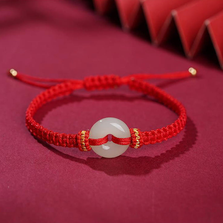 Pulsera trenzada de abundancia de jade con hebilla de paz de Buddha Stones