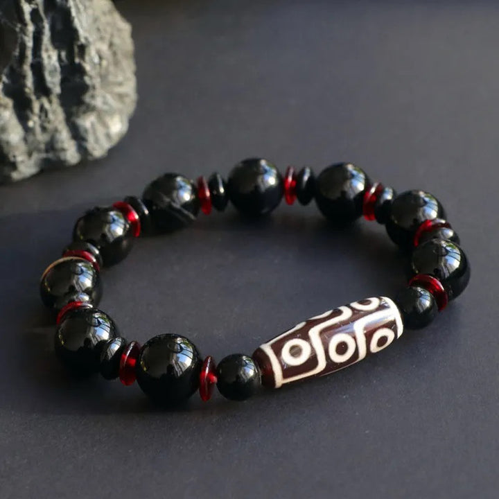 Pulsera de protección de la riqueza con cuentas Dzi de nueve ojos de ónix negro y Buddha Stones