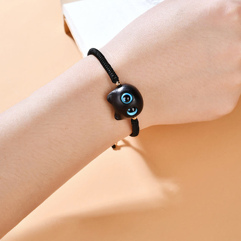 Pulsera trenzada con nudo de King Kong de la paz con patrón de cabeza de gato de madera de ébano con Buddha Stones - image 15