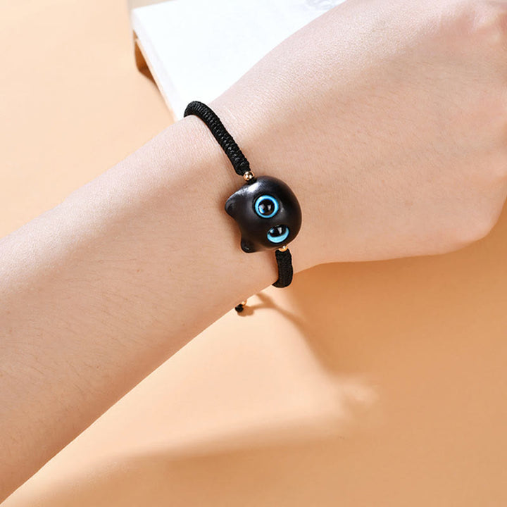 Pulsera trenzada con nudo de King Kong de la paz con patrón de cabeza de gato de madera de ébano con Buddha Stones - image 15