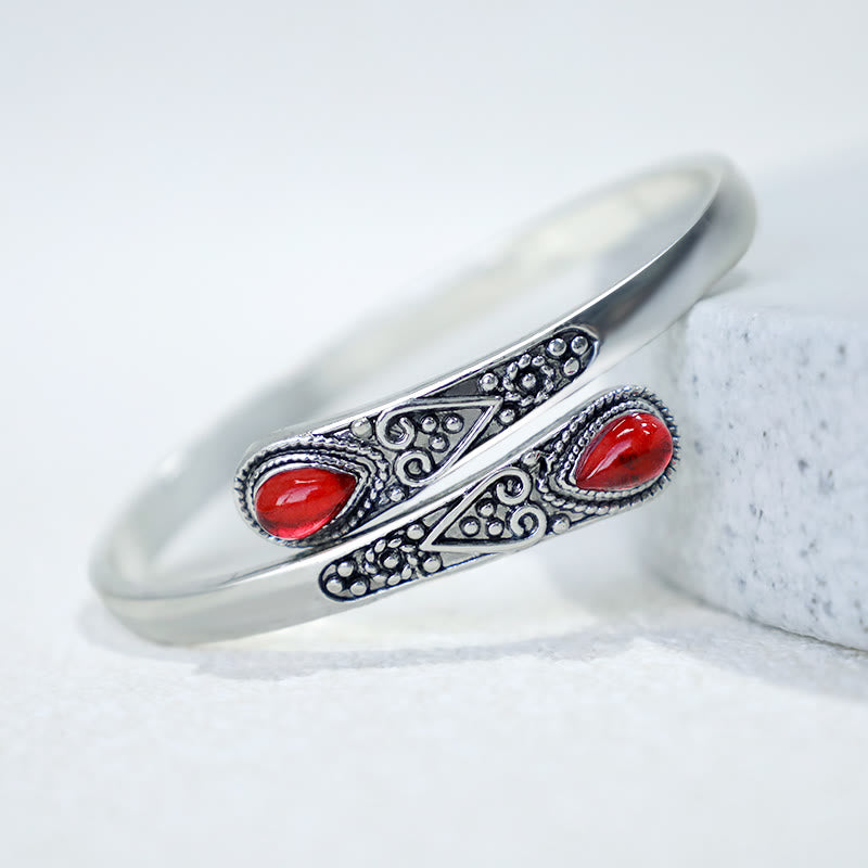 Brazalete de pulsera curativo con patrón de gota de agua de circonita con Buddha Stones
