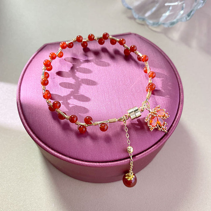 Pulsera con amuleto de la suerte de hoja de arce roja con Buddha Stones