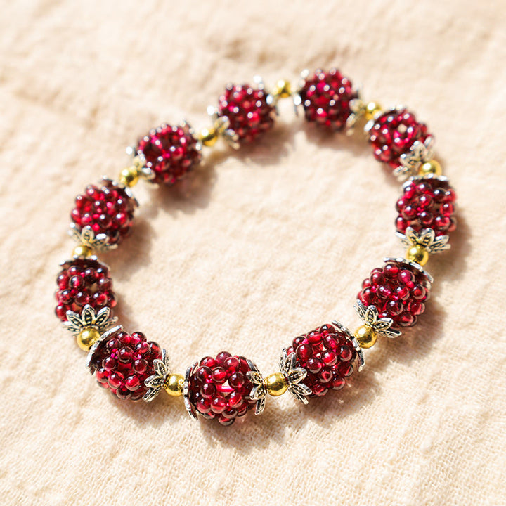 Pulsera curativa de granate natural con Buddha Stones