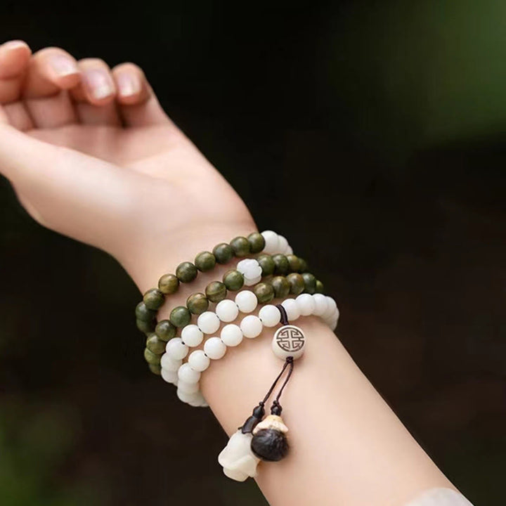Pulsera calmante de semillas de Bodhi de sándalo verde natural con Buddha Stones