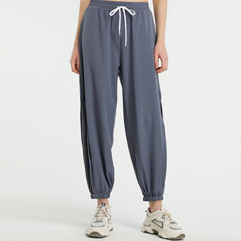 Pantalones deportivos de yoga sueltos de cintura alta con Buddha Stones y bolsillos