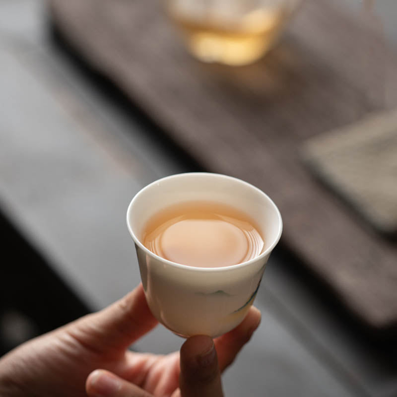 Taza de té de cerámica con Buddha Stones, flor de loto, hoja, montaña, pabellón, alce, peonía, taza de té de Kung Fu