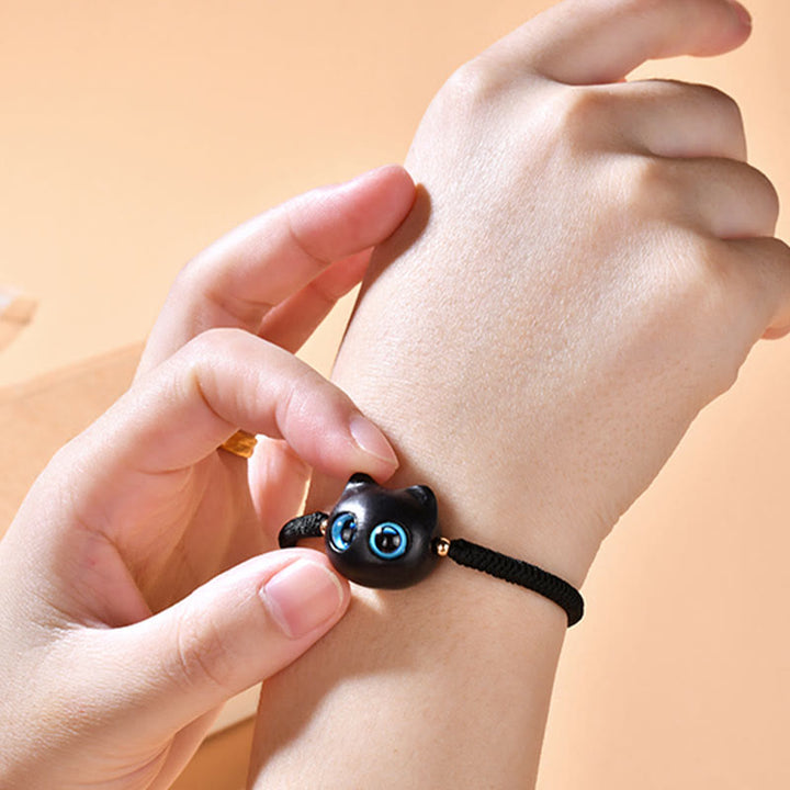 Pulsera trenzada con nudo de King Kong de la paz con patrón de cabeza de gato de madera de ébano con Buddha Stones - image 19