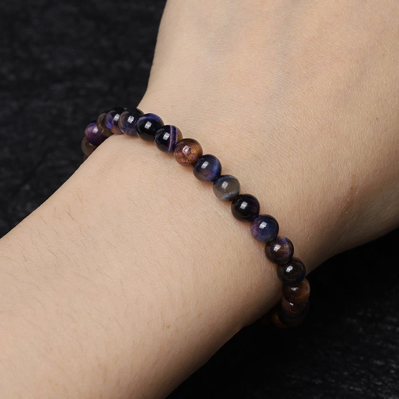 Pulsera de fuerza de protección de ojo de tigre púrpura natural de Buddha Stones