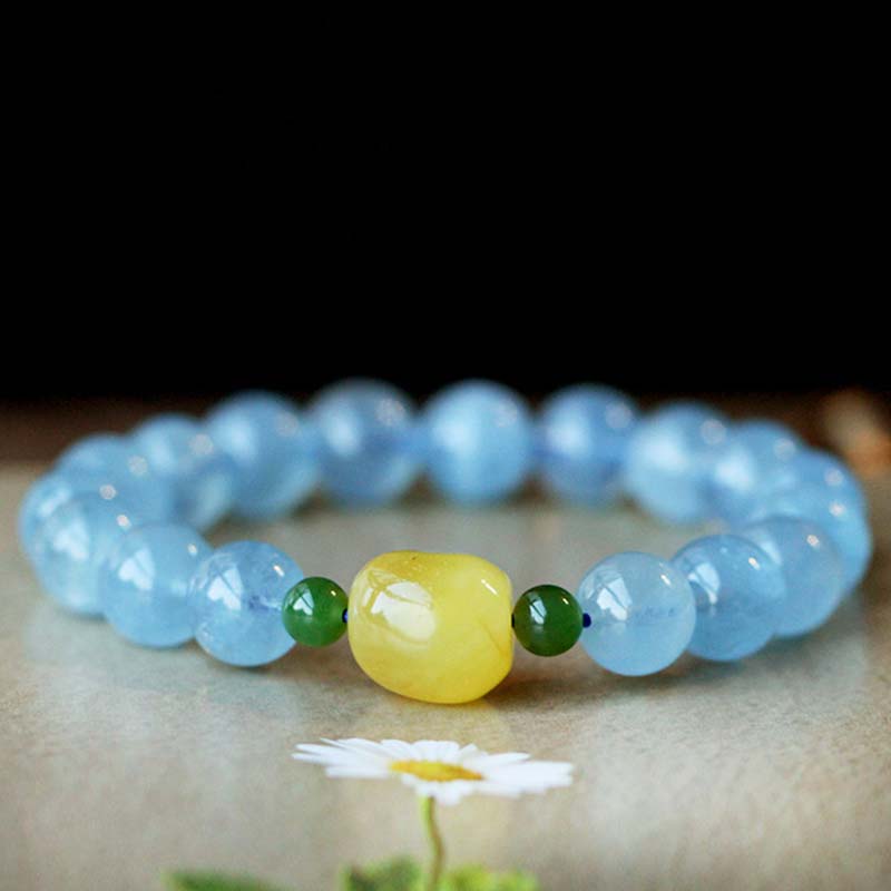 Pulsera curativa de serenidad con cuentas de ámbar y aguamarina natural
