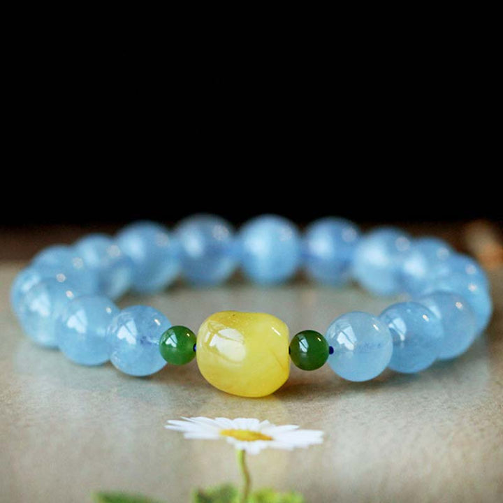 Pulsera curativa de serenidad con cuentas de ámbar y aguamarina natural