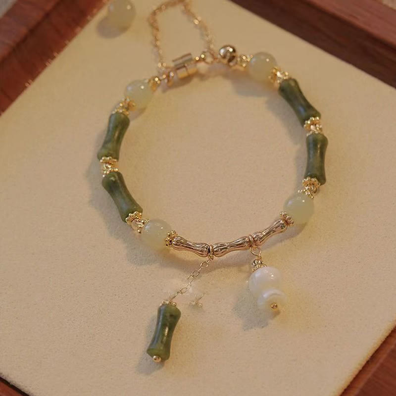 Pulsera de la abundancia de la suerte del patrón del lirio de los valles de la hoja de bambú del jade de las Buddha Stones