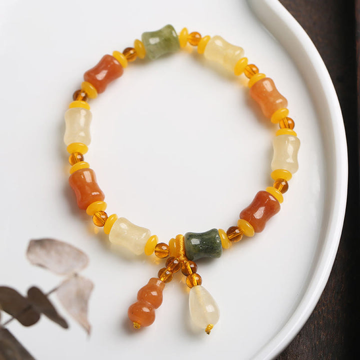 Pulsera con dijes de riqueza de calabaza de jade de seda dorada natural