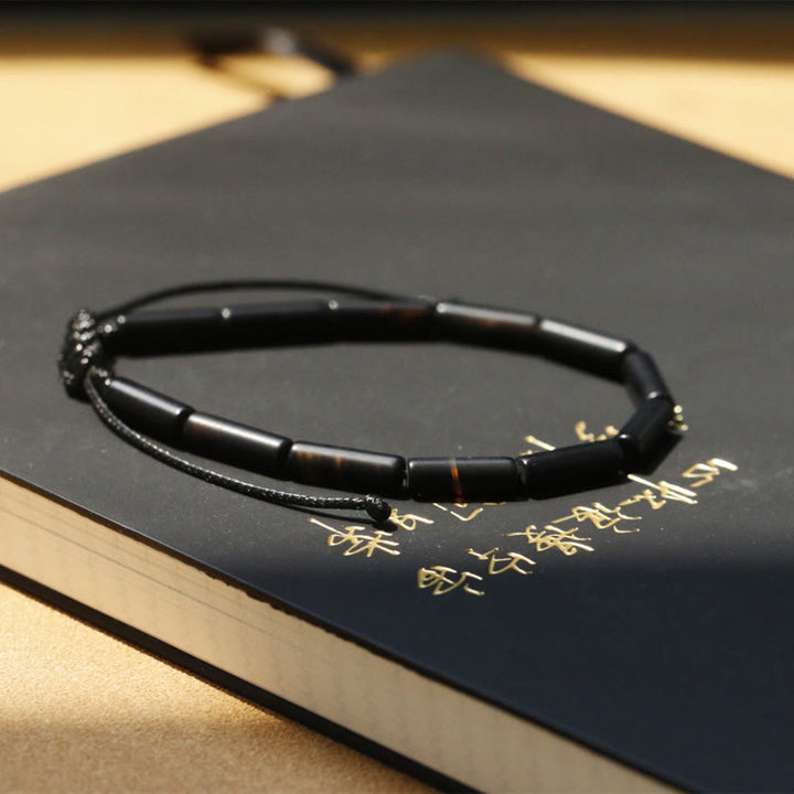 Pulsera de protección de soporte de cuentas de ónix negro con Buddha Stones