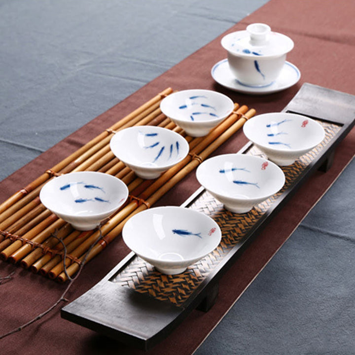 Buddha Stones Jingdezhen, porcelana azul y blanca, pez Koi, taza de té de cerámica, tazas de té de Kung Fu