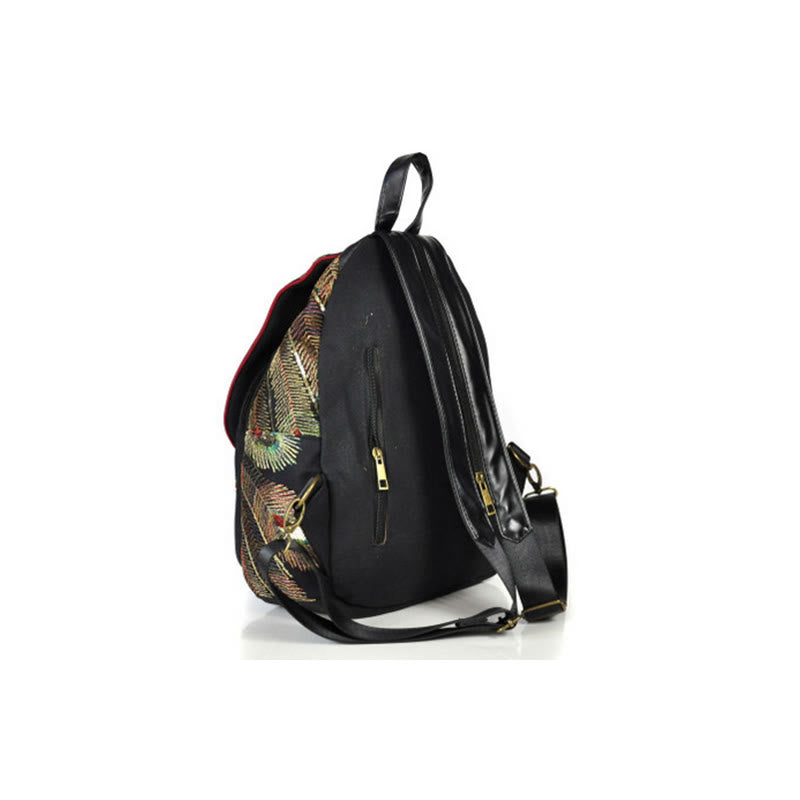 Mochila con borlas de lona con bordado de pavo real