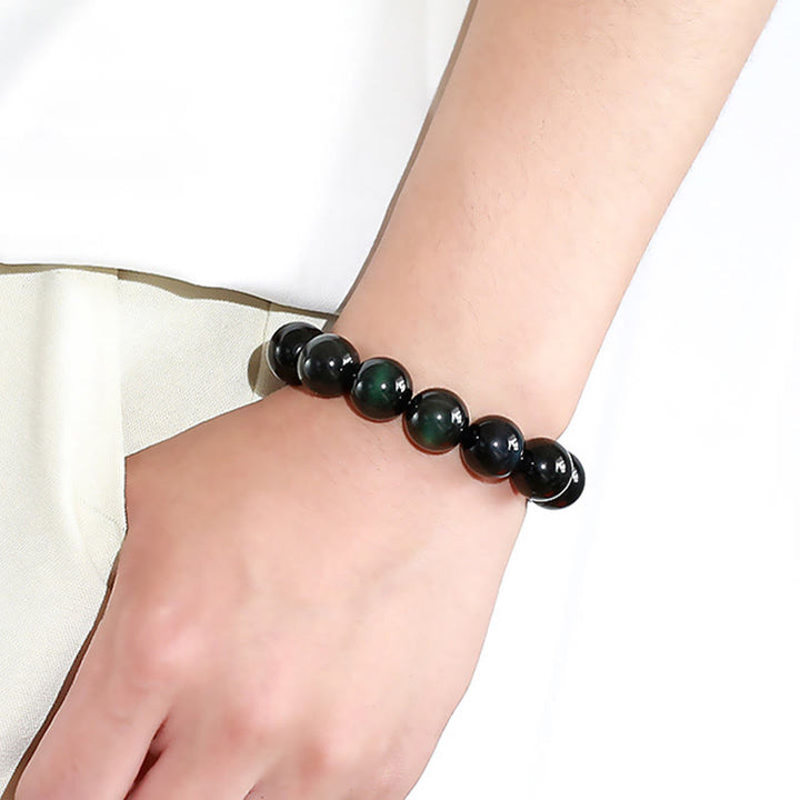 Pulsera de riqueza de obsidiana de ojo verde natural con Buddha Stones