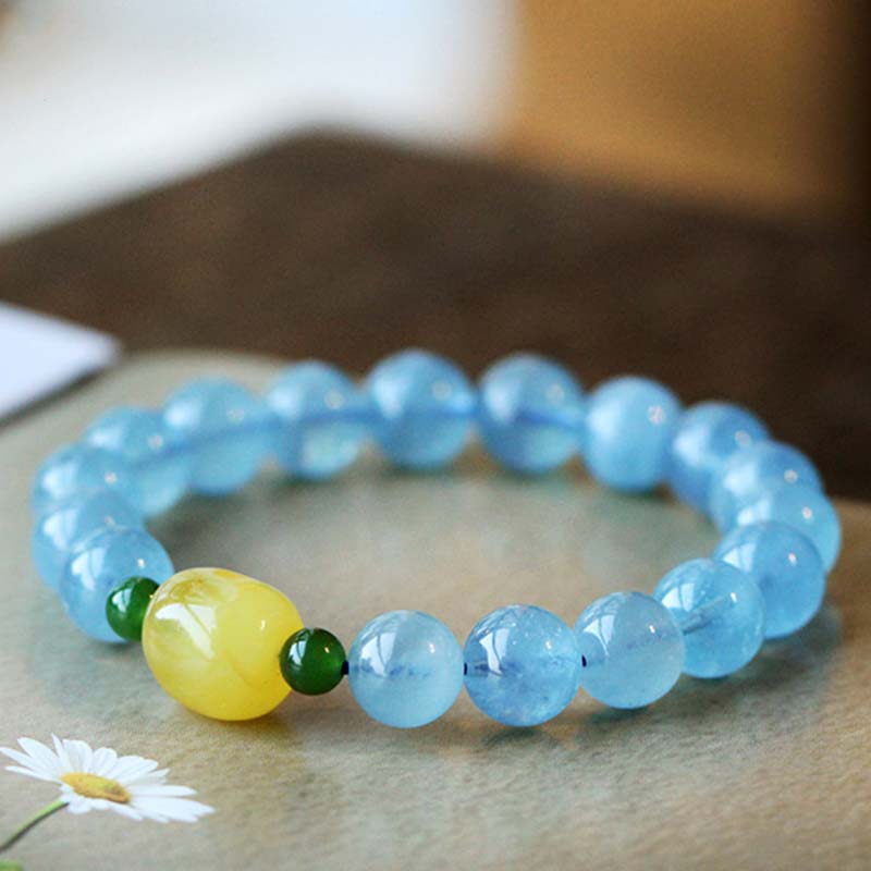 Pulsera curativa de serenidad con cuentas de ámbar y aguamarina natural