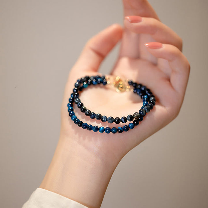 Pulsera de cadena de protección con piedra de ojo de tigre azul natural de Buddha Stones