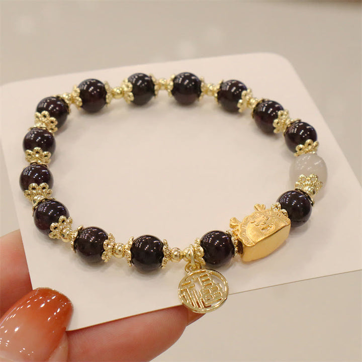 Buddha Stones Año del Dragón Ágata roja Cuarzo fresa Obsidiana negra Jade Granate Perla Cinabrio Bola de masa Dragón Suerte Fu Pulsera con personajes - Granate (circunferencia de la muñeca 14-19 cm) - image 24