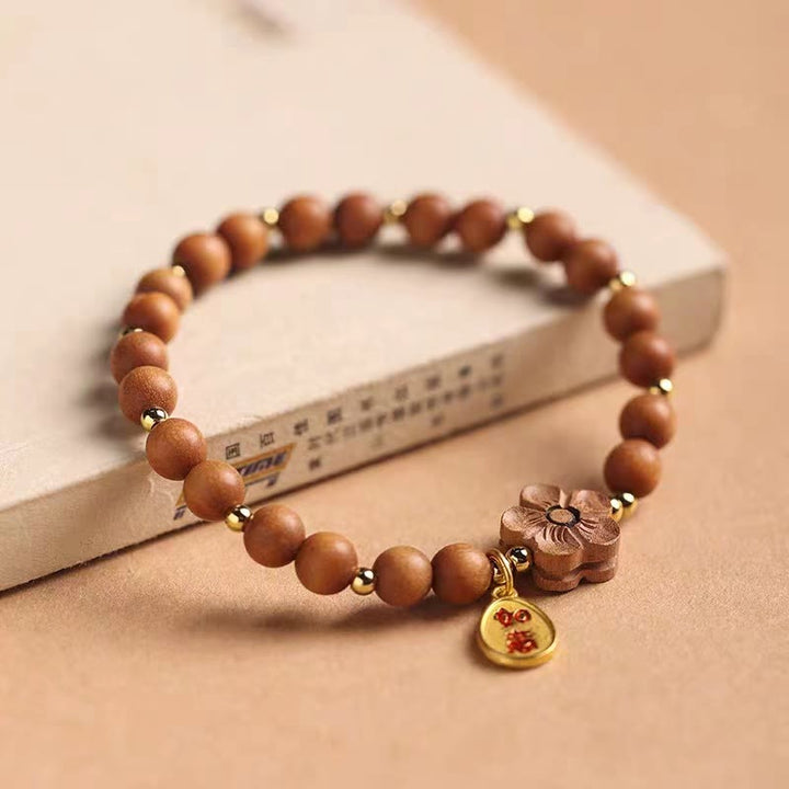 Buddha Stones Sándalo Natural Flor de Melocotón Hoja Pequeña Sándalo Rojo Ruyi Charm Pulsera de Protección