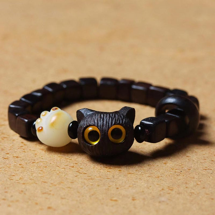 Buddha Stones Madera de ébano Lindo gato Bodhi Semilla Pata Garra Cuentas cuadradas Pulsera tranquila - image 5