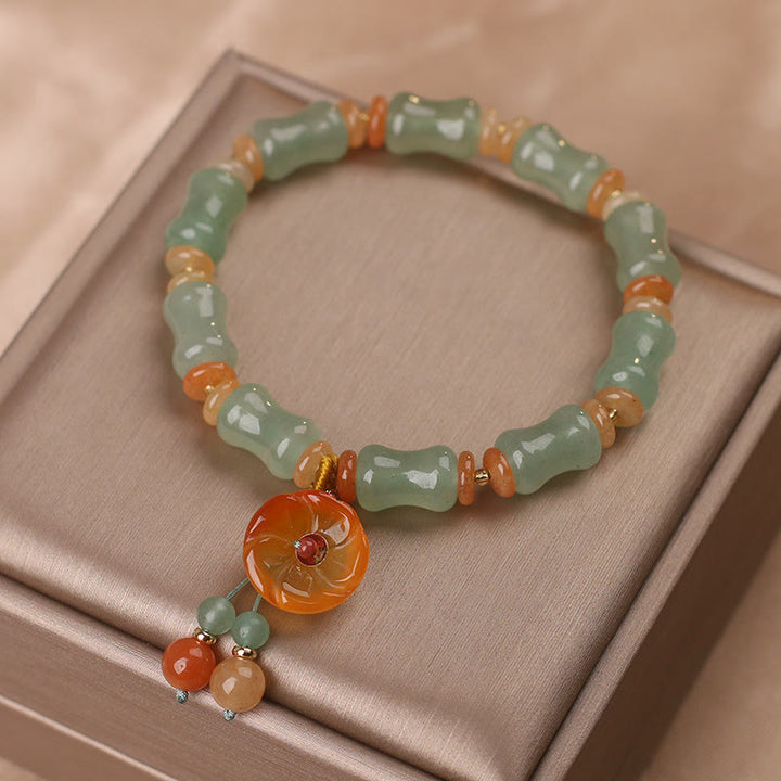 Pulsera de la suerte con patrón de flores de bambú y jade natural de Buddha Stones