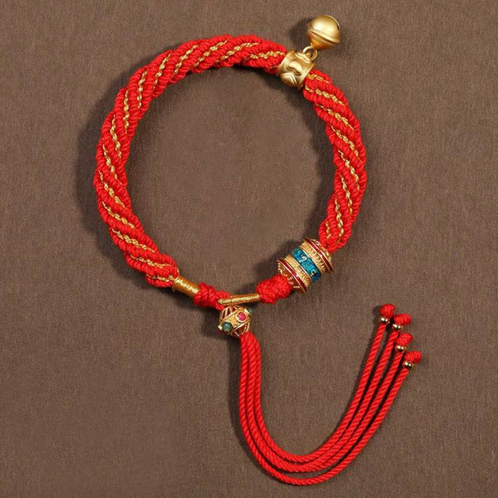 Pulsera de cuerda trenzada con dije de campana y rueda de oración Thangka de protección de la suerte hecha a mano tibetana