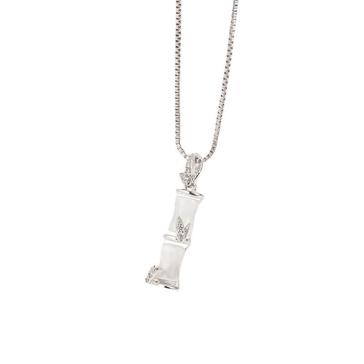 Colgante de collar de armonía con patrón de bambú de calcedonia de Buddha Stones