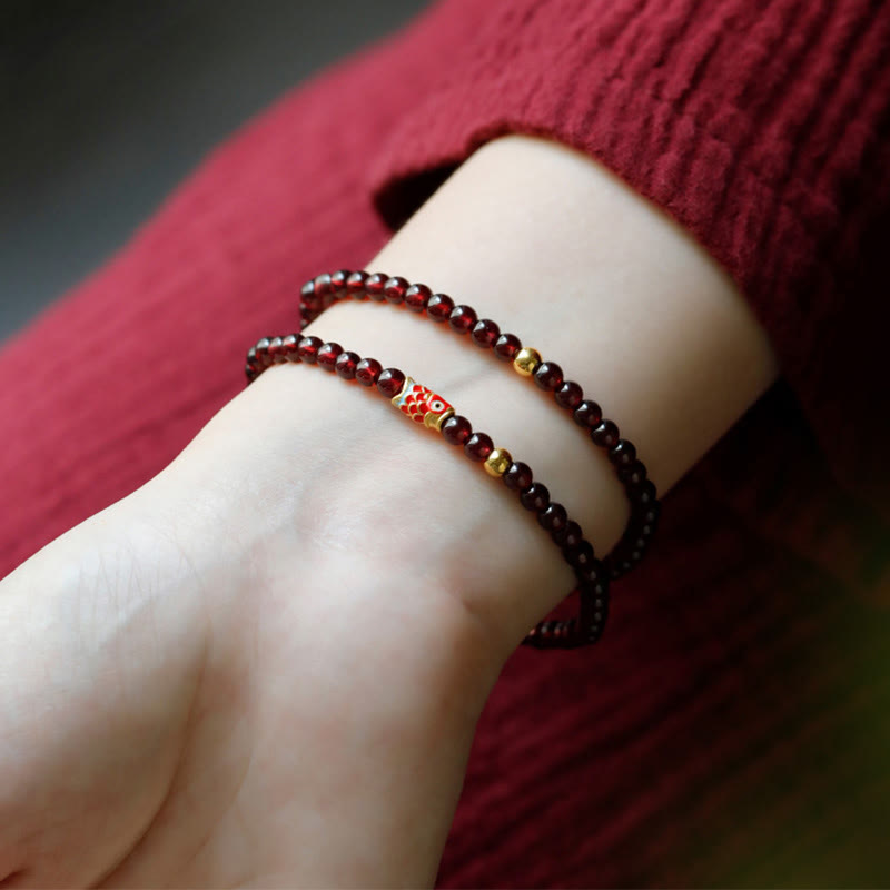Pulsera de protección con granate natural y pez Koi de oro 999 de Buddha Stones - image 10