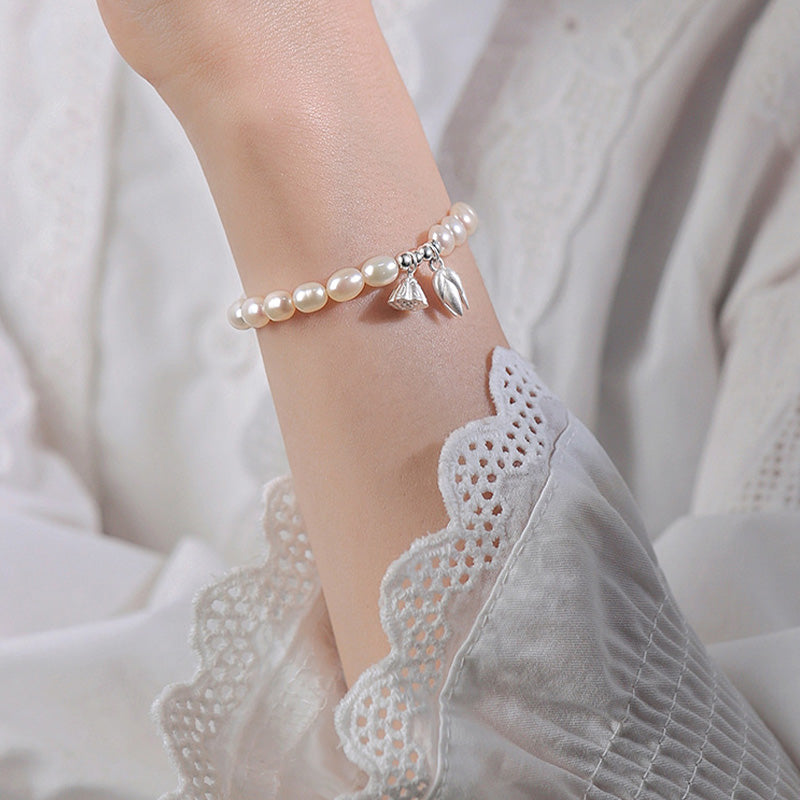 Pulsera curativa de perlas naturales con vaina de flor de loto de plata de ley 999 con Buddha Stones