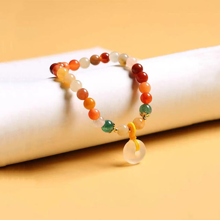 Pulsera de riqueza con hebilla de paz de jade de seda dorada colorida chapada en oro de 14 Buddha Stones