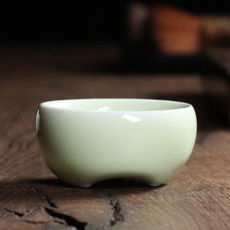 Taza de té de cerámica con forma de pez koi de colores y Buddha Stones