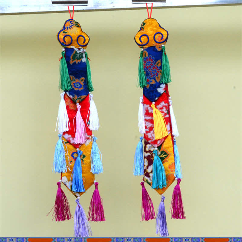 Flor de loto Ocho símbolos auspiciosos Meditación Iluminación Borlas coloridas Arte de pared