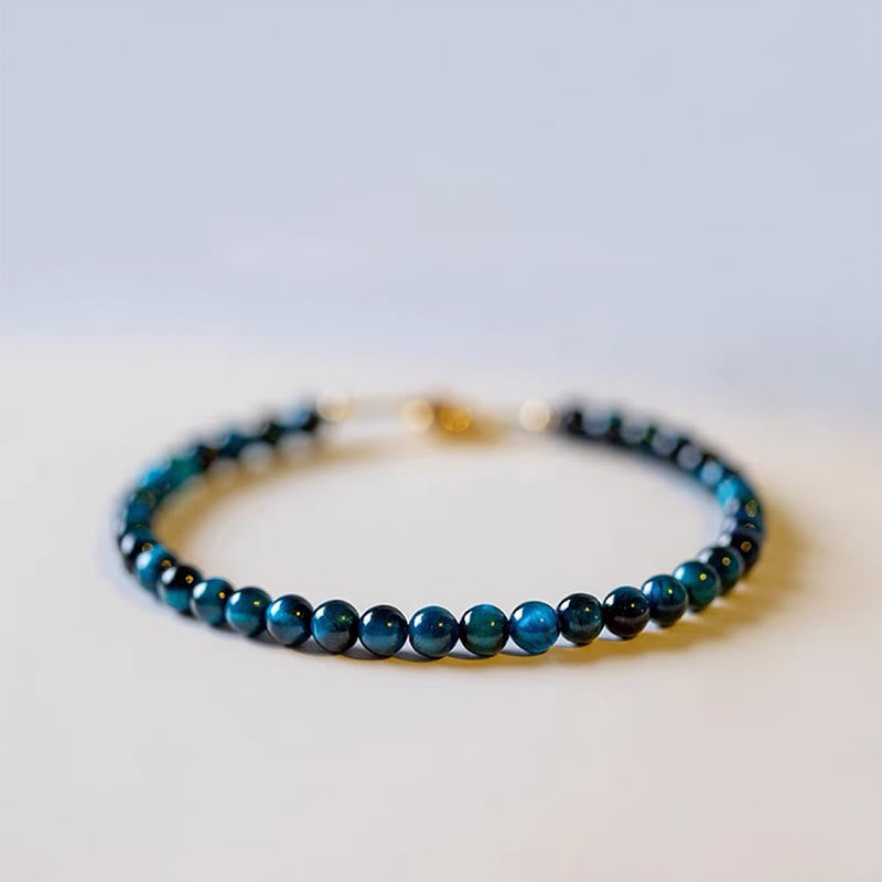 Pulsera de cadena de protección con piedra de ojo de tigre azul natural de Buddha Stones