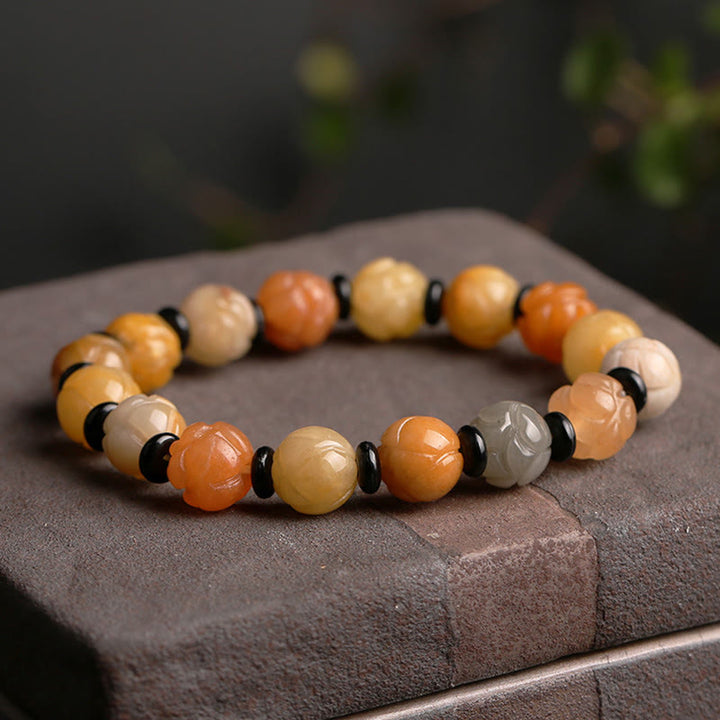 Pulsera de suerte y riqueza de loto de jade de seda dorada
