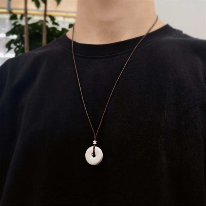 Colgante de collar de protección con hebilla de paz redonda de plata de ley 999 con Buddha Stones