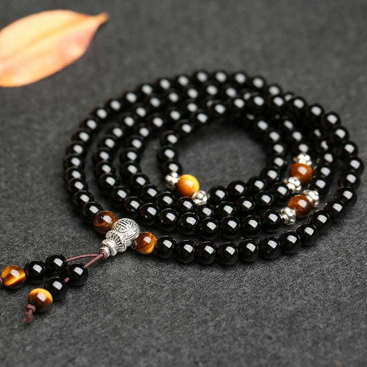 Pulsera Mala con bendición de ojo de tigre de obsidiana negra con Buddha Stones